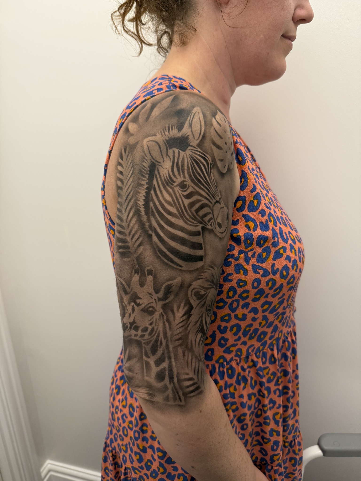 An image of a half tattoo sleeve created using airbrush temporary tattoos. Suitable for Wedding entertainment, Festival Entertainment and more.