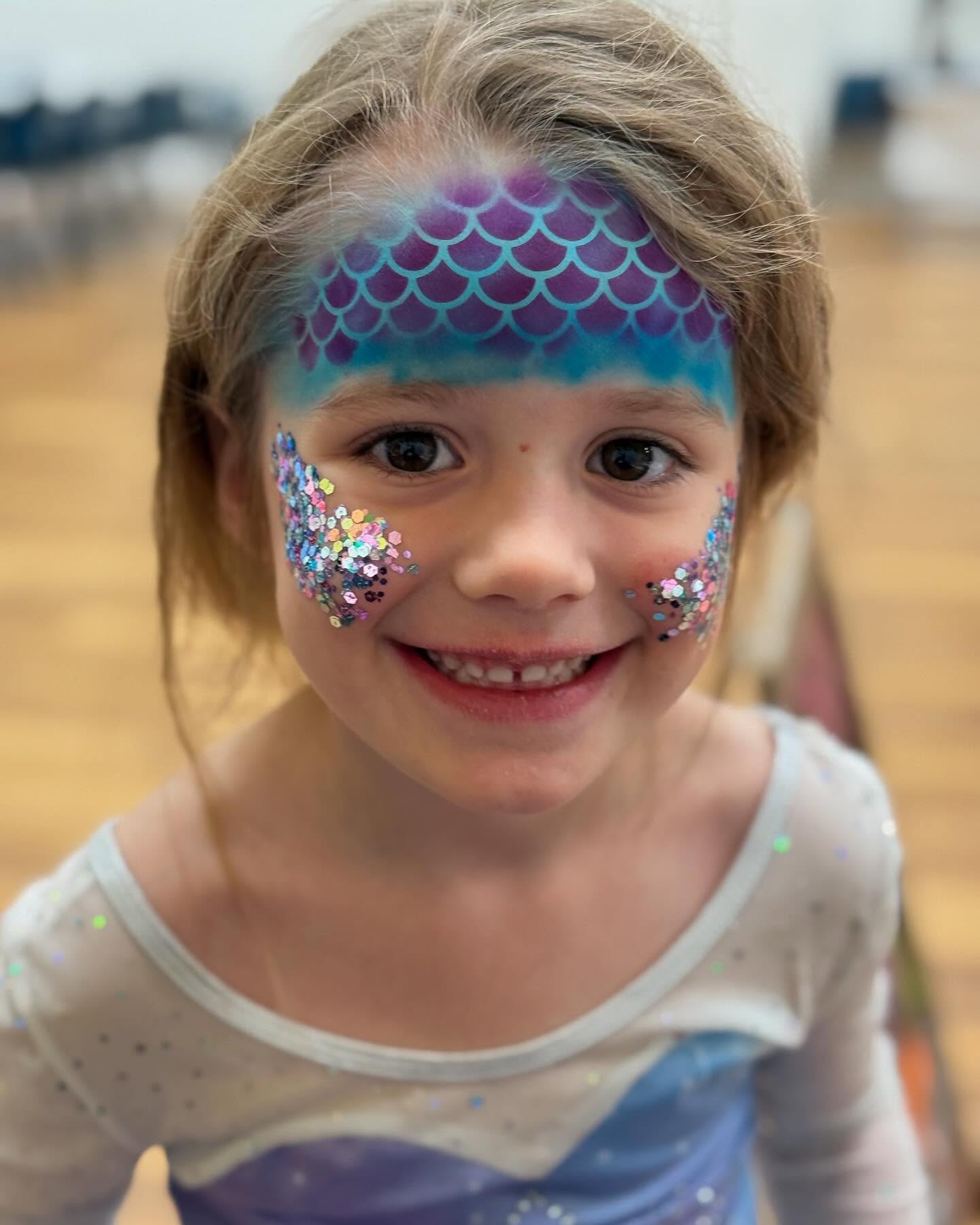 A beautiful princess having had her face painted with our mermaid designs. We offer Face Painting in Peterborough, Spalding, and Lincolnshire,