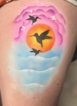 Our Summer Sunset image created using airbrush body art. We supply face painting in Spalding and Airbrush Tattoos in Spalding.